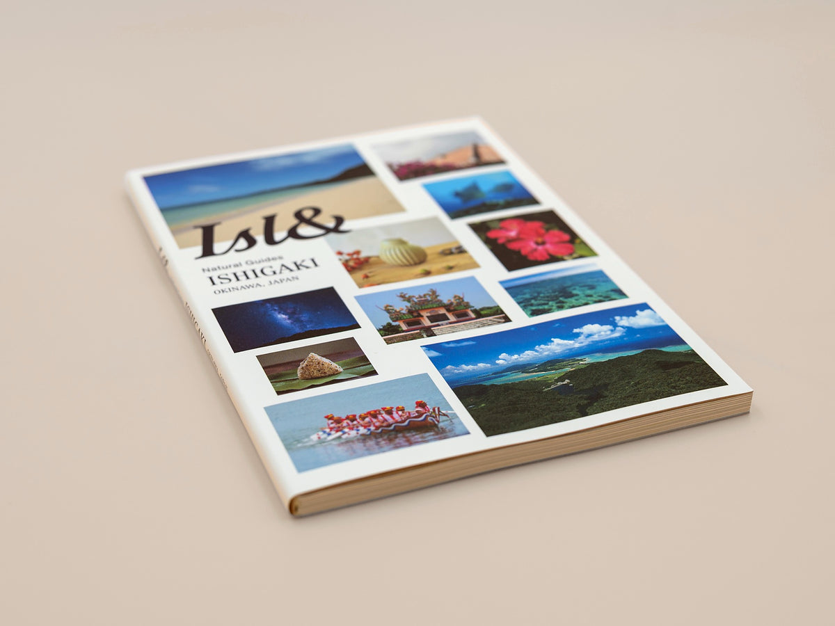 Angled view of ISL& Natural Guides: Ishigaki, showing the front cover, spine and paper edges.